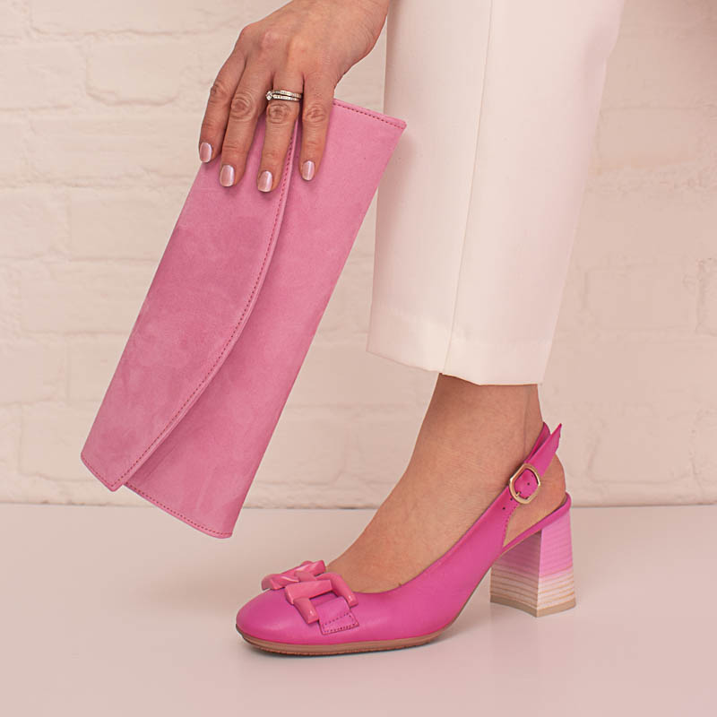 Hot pink shoes and cheap clutch bag